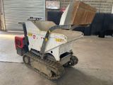 a small machine that is parked in a garage