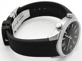 a watch that is sitting on a white surface