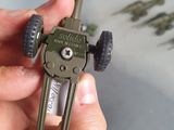 a person holding a small tool in their hand