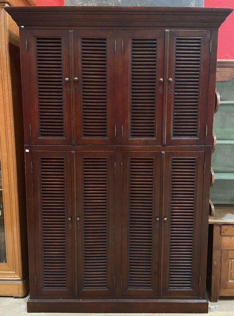 Grand buffet deux corps en bois exotique à quatre portes per…