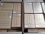 several boxes are stacked on top of each other on a table