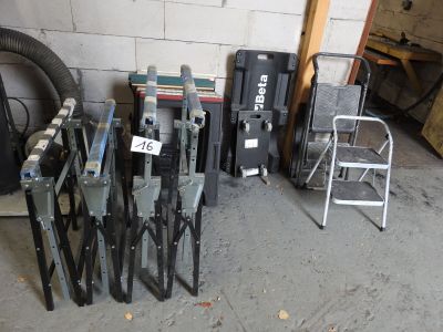 a lot of tools that are sitting on the floor