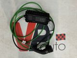 a close up of a black and green wire connected to a black and green wire
