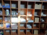 a room with a lot of shelves and a lot of items on the shelves