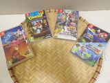 several video games are arranged in a circle on a table