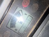 an image of a close up of a clock on a machine