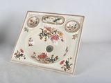 a picture of a square plate with a floral design on it