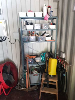 a shelf that has a bunch of items on it