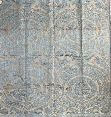 an image of a blue rug with a pattern on it
