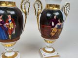 two vases with pictures of snow white and prince on them