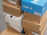 several boxes stacked on top of each other on a floor