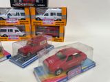 three red toy cars are sitting on display in plastic cases