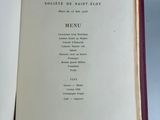 a close up of an open book on a table