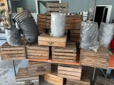 a pile of wooden crates sitting on top of a table