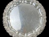 an image of a silver plate on a black background