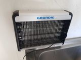 a small air conditioner sitting on top of a sink
