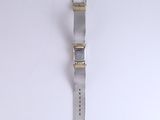 an image of a silver and gold watch on a white surface