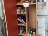a cabinet that has a lot of items in it