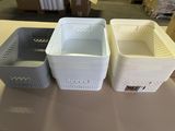 three baskets sitting on a table next to each other