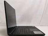 an open laptop computer sitting on top of a white surface