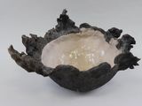 a small bowl that has some sort of decoration on it