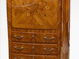 an image of an antique wooden chest of drawers