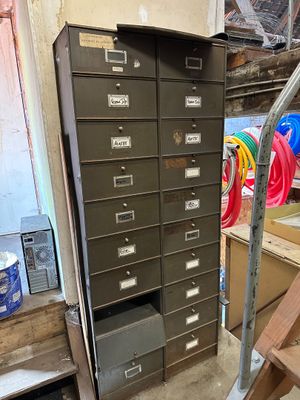 a lot of filing cabinets that are in a room