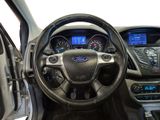 a picture of a car dashboard with a steering wheel