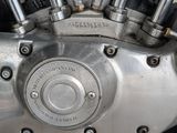 a close up of a motorcycle engine with nozzles on it