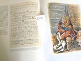an open book with a picture of a man sitting on a horse