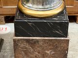 a vase that is sitting on top of a box