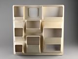 a picture of a white display case with many compartments