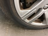 a close up of a tire on a car ' s rim