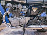a close up of a motorcycle on display at a show