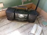 a radio that is sitting in the corner of a room