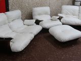 a picture of a living room with a lot of white furniture