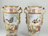 two vases with birds and flowers painted on them