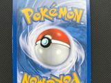 a close up of a card with a pokemon ball on it
