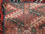 an image of a close up of a rug with a cat on it