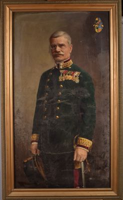 portrait d'un homme en uniforme militaire tenant une canne
