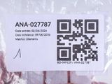 a person holding a piece of meat with a qr code on it