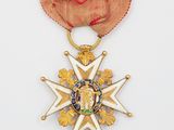une image d'une médaille avec un ruban rouge sur fond blanc