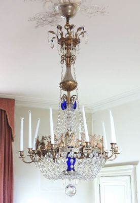 a chandelier that is hanging from the ceiling