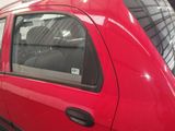 a red car that is parked in a garage