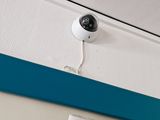 a picture of a camera mounted to the ceiling of a hospital room