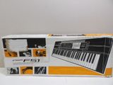 a box with a keyboard inside of it on a table