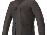 the alpine jacket in black with a red patch on the chest