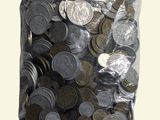 a bag full of coins with a tag on it