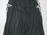 the shorts are black and white with a white stripe on the side