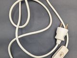 a white cord that is connected to an electrical plug